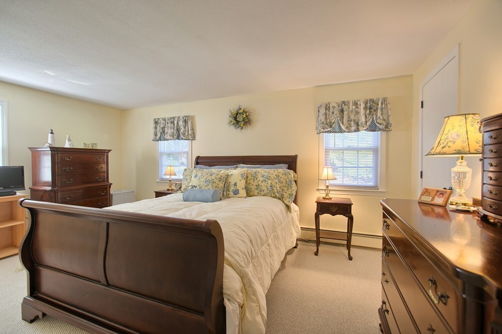 25 Autumn Road Lunenburg, MA 01462 - Photo 15 of 26 a bedroom with a bed and a desk