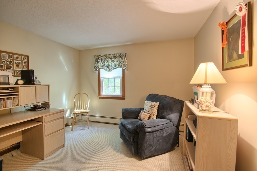 25 Autumn Road Lunenburg, MA 01462 - Photo 19 of 26 a living room with furniture and a window