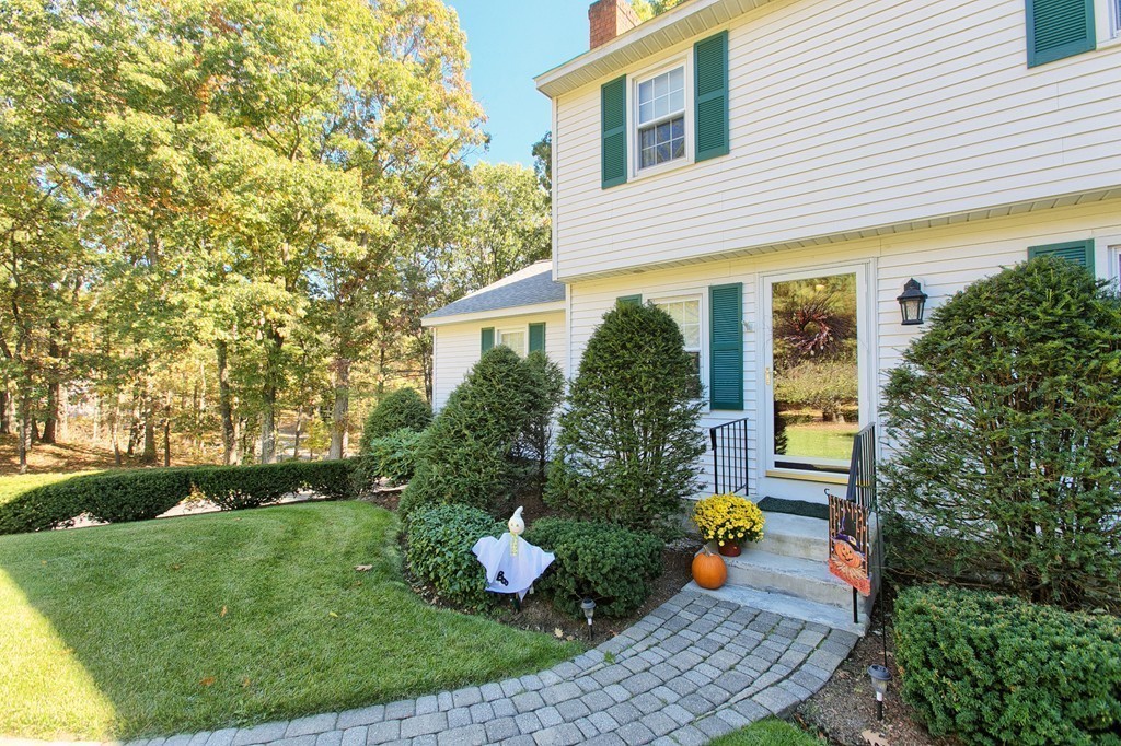 25 Autumn Road Lunenburg, MA 01462 - Photo 2 of 26 a view of a chair and table in backyard of the house