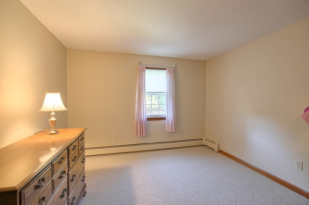 25 Autumn Road Lunenburg, MA 01462 - Photo 21 of 26 a view of a room that has a sink and a chair in it