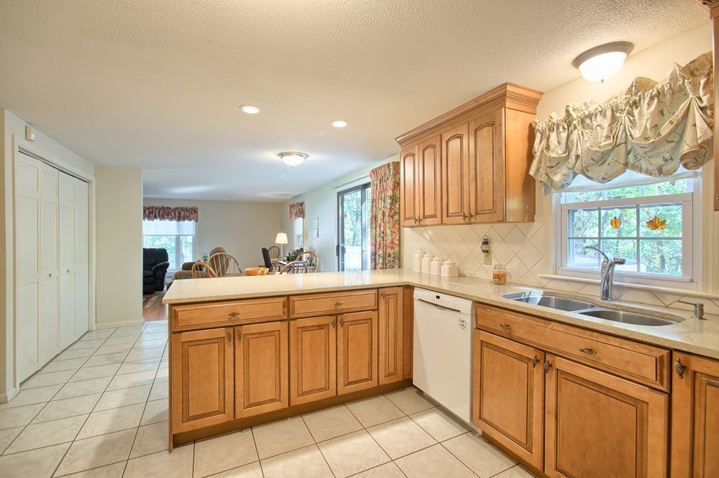 25 Autumn Road Lunenburg, MA 01462 - Photo 6 of 26 a kitchen with a sink and cabinets