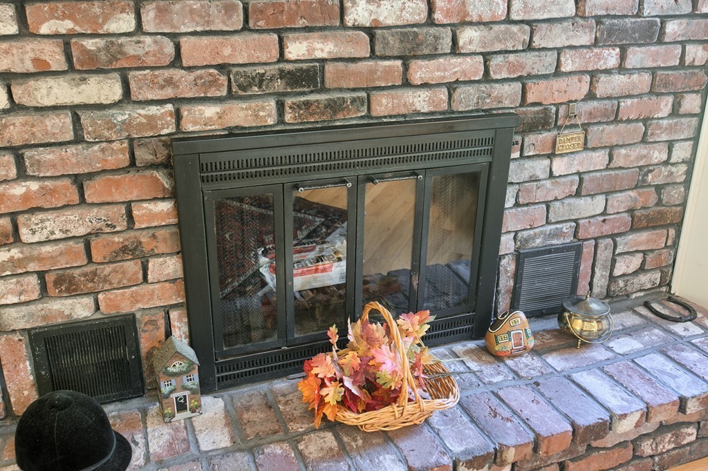 25 Autumn Road Lunenburg, MA 01462 - Photo 9 of 26 a dining room with furniture and a fireplace