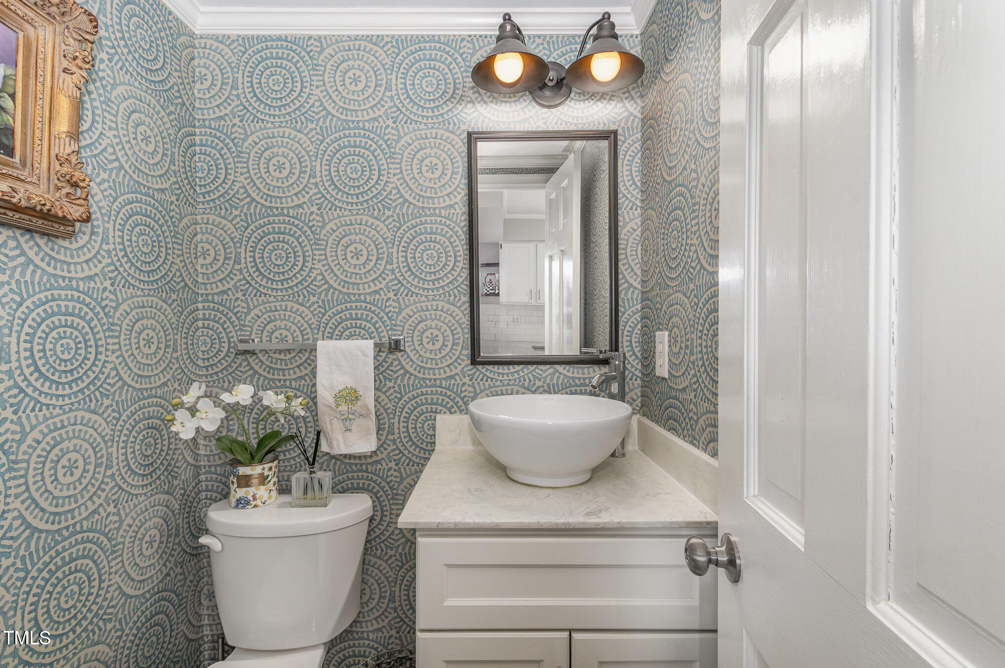 401 Rosehaven Drive Raleigh, NC 27609 - Photo 12 of 26 Elegant powder room