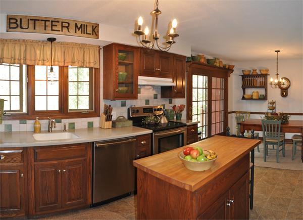 131 Aubinwood Road Amherst, MA 01002 - Photo 12 of 30 a kitchen with a sink stove and cabinets