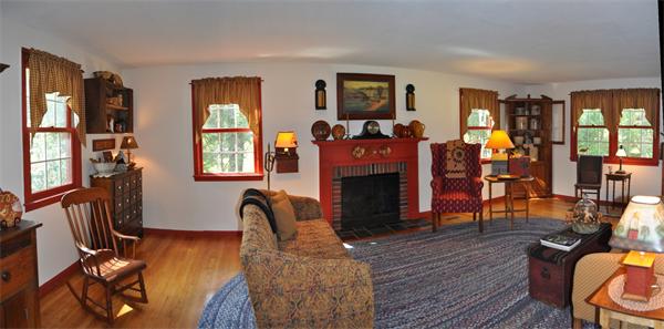 131 Aubinwood Road Amherst, MA 01002 - Photo 15 of 30 a living room with furniture a window and wooden floor