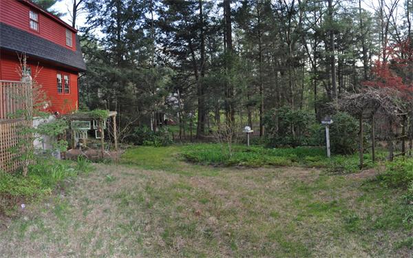 131 Aubinwood Road Amherst, MA 01002 - Photo 30 of 30 a view of a yard with plants and trees
