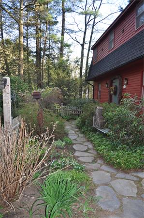 131 Aubinwood Road Amherst, MA 01002 - Photo 4 of 30 a front view of a house with a yard