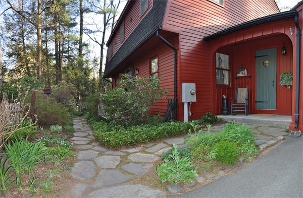 131 Aubinwood Road Amherst, MA 01002 - Photo 8 of 30 a front view of a house with garden