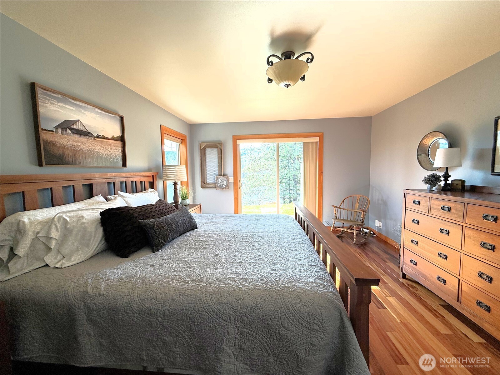 8 Julian Bay Road Republic, WA 99166 - Photo 8 of 40 a bedroom with a bed and wooden floor