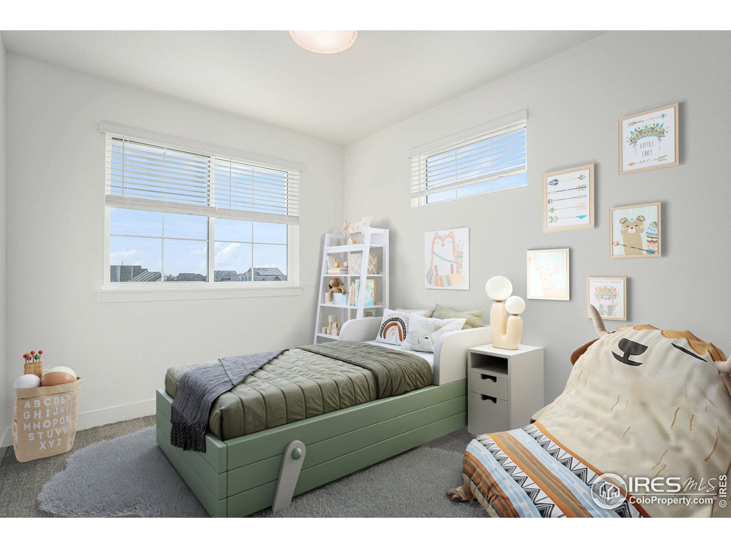 5049 Avon Avenue Loveland, CO 80538 - Photo 8 of 10 a bedroom with furniture and a window