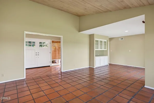a view of an empty room and window
