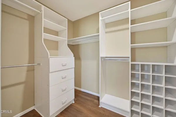 a view of a large body of water with a building in the background