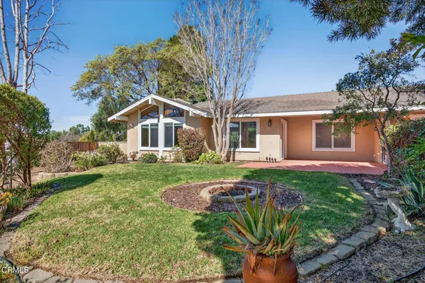 a view of a golf course with a garden