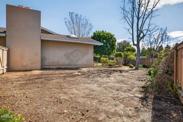 a view of a town with mountains in the background