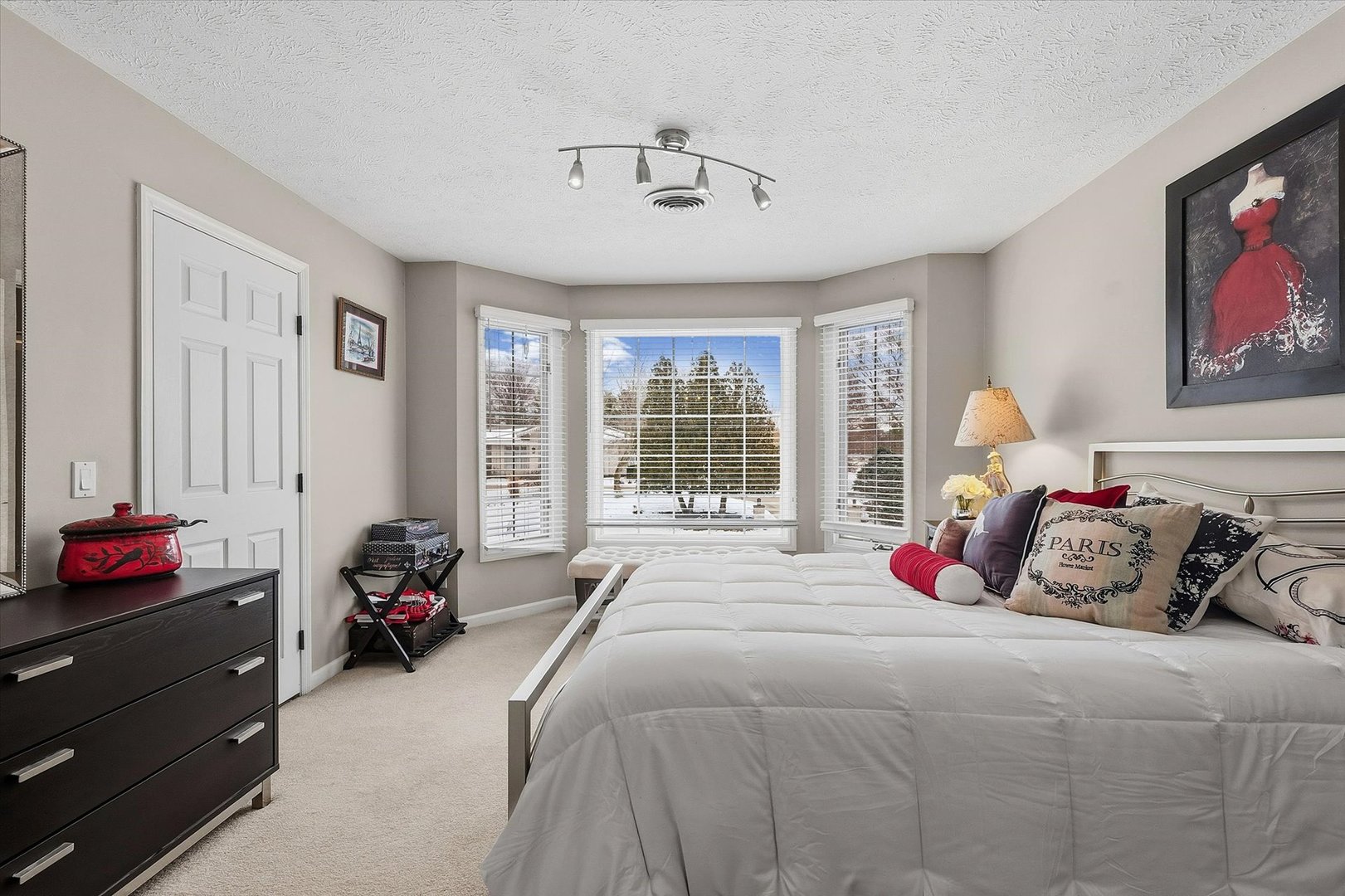 1307 Cross Creek Road Mahomet, IL 61853 - Photo 42 of 75 a spacious bedroom with a bed and a window