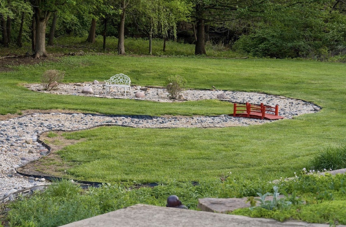 1307 Cross Creek Road Mahomet, IL 61853 - Photo 65 of 75 a view of a golf course with a garden