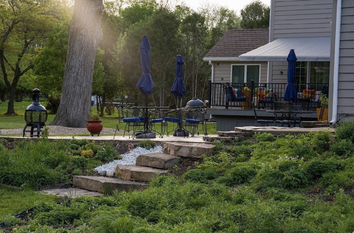 1307 Cross Creek Road Mahomet, IL 61853 - Photo 67 of 75 a view of a house with backyard sitting area and garden