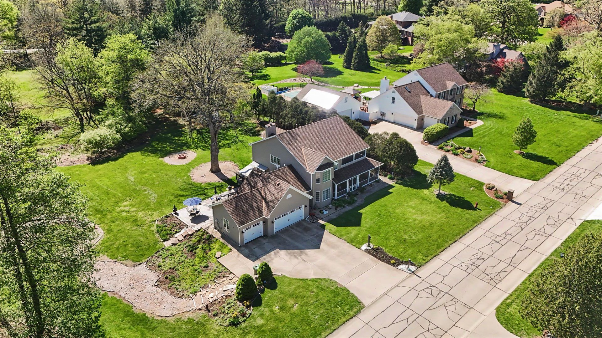1307 Cross Creek Road Mahomet, IL 61853 - Photo 74 of 75 an aerial view of a house with garden