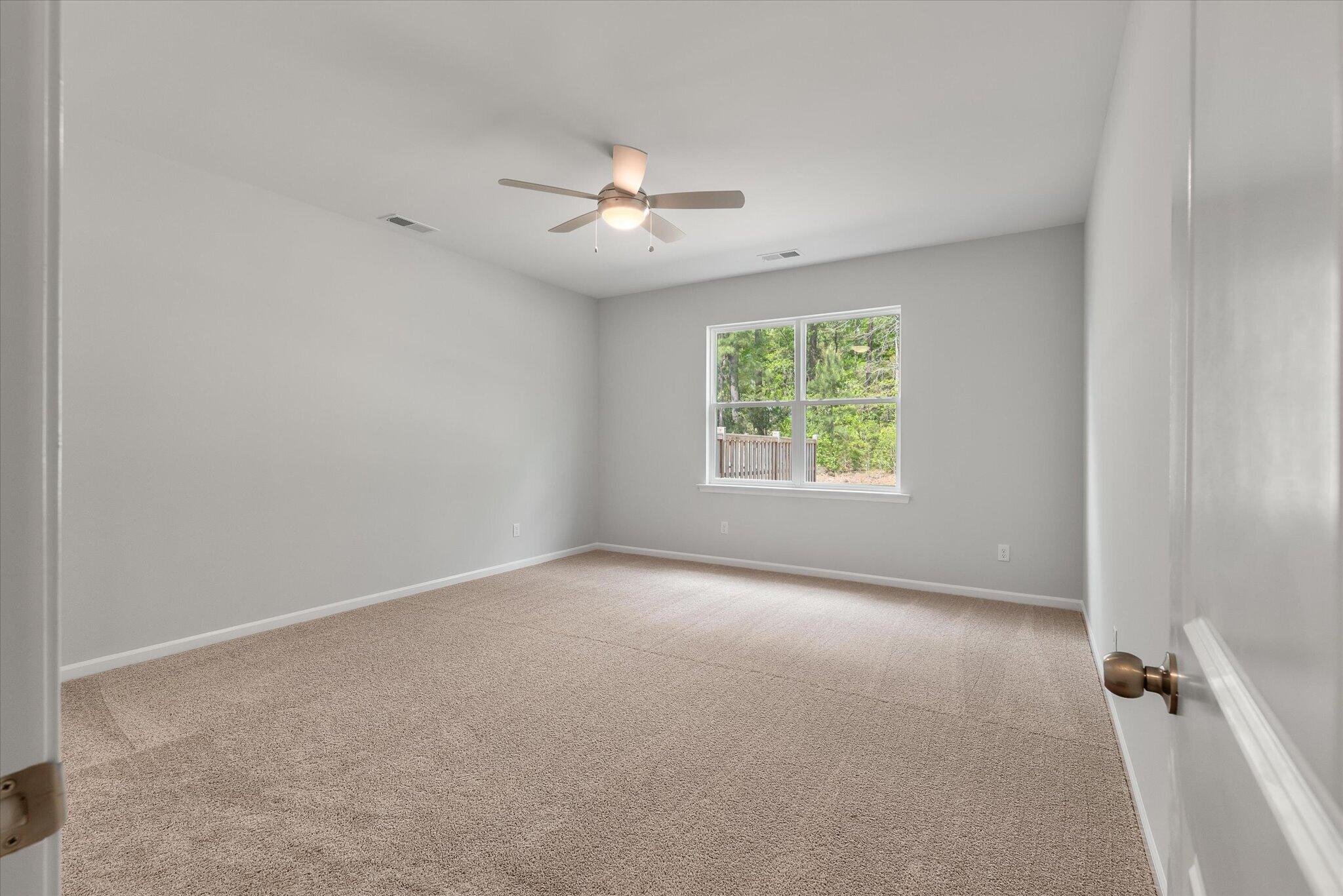 205 Palfrey Drive Ridgeville, SC 29472 - Photo 18 of 34 Primary Bedroom