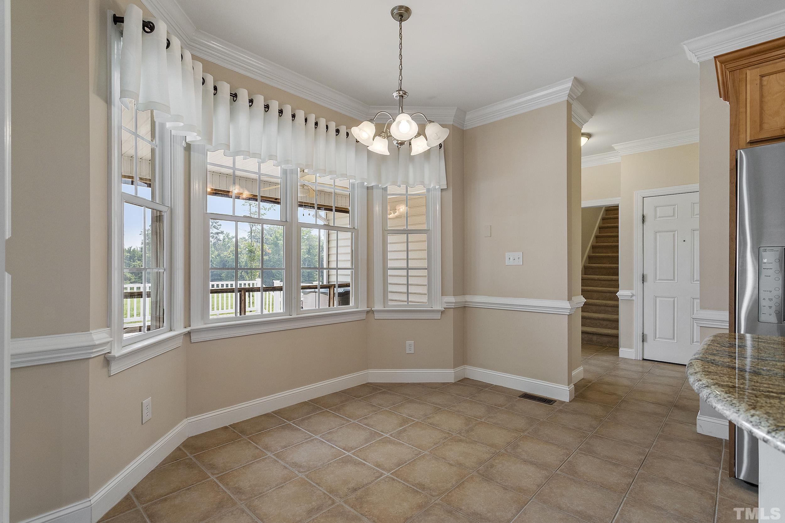 90 Fletcher Ridge Road Timberlake, NC 27583 - Photo 13 of 26 a view of an empty room with a window
