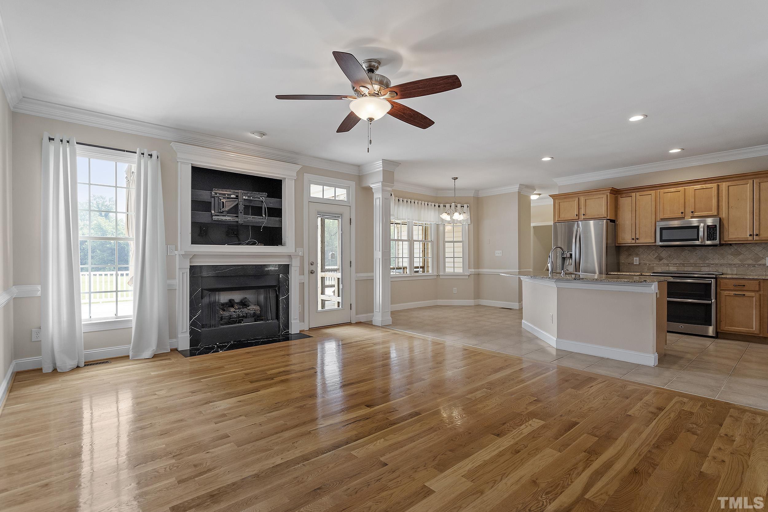 90 Fletcher Ridge Road Timberlake, NC 27583 - Photo 15 of 26 a view of an empty room window and wooden floor