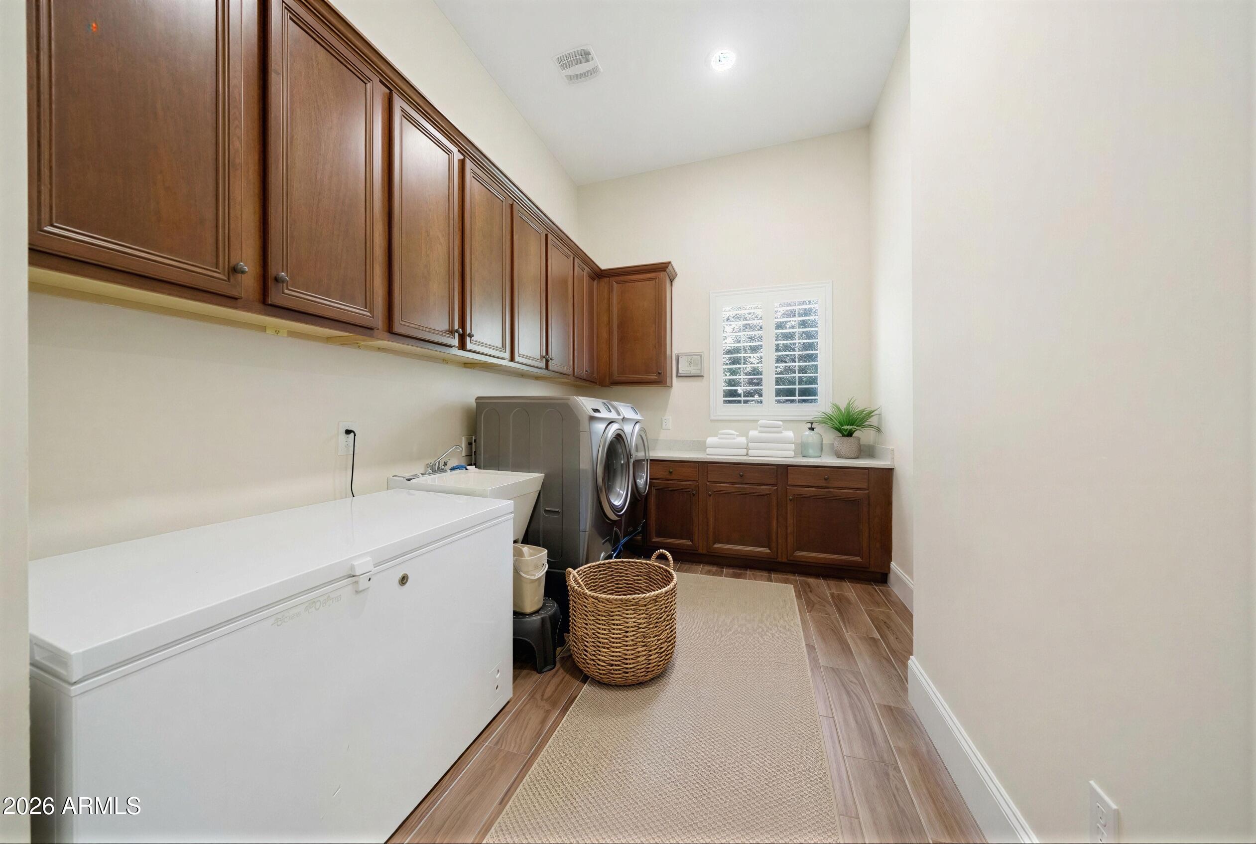 8974 North 8th Lane Phoenix, AZ 85021 - Photo 14 of 29 a kitchen with a sink and a stove top oven