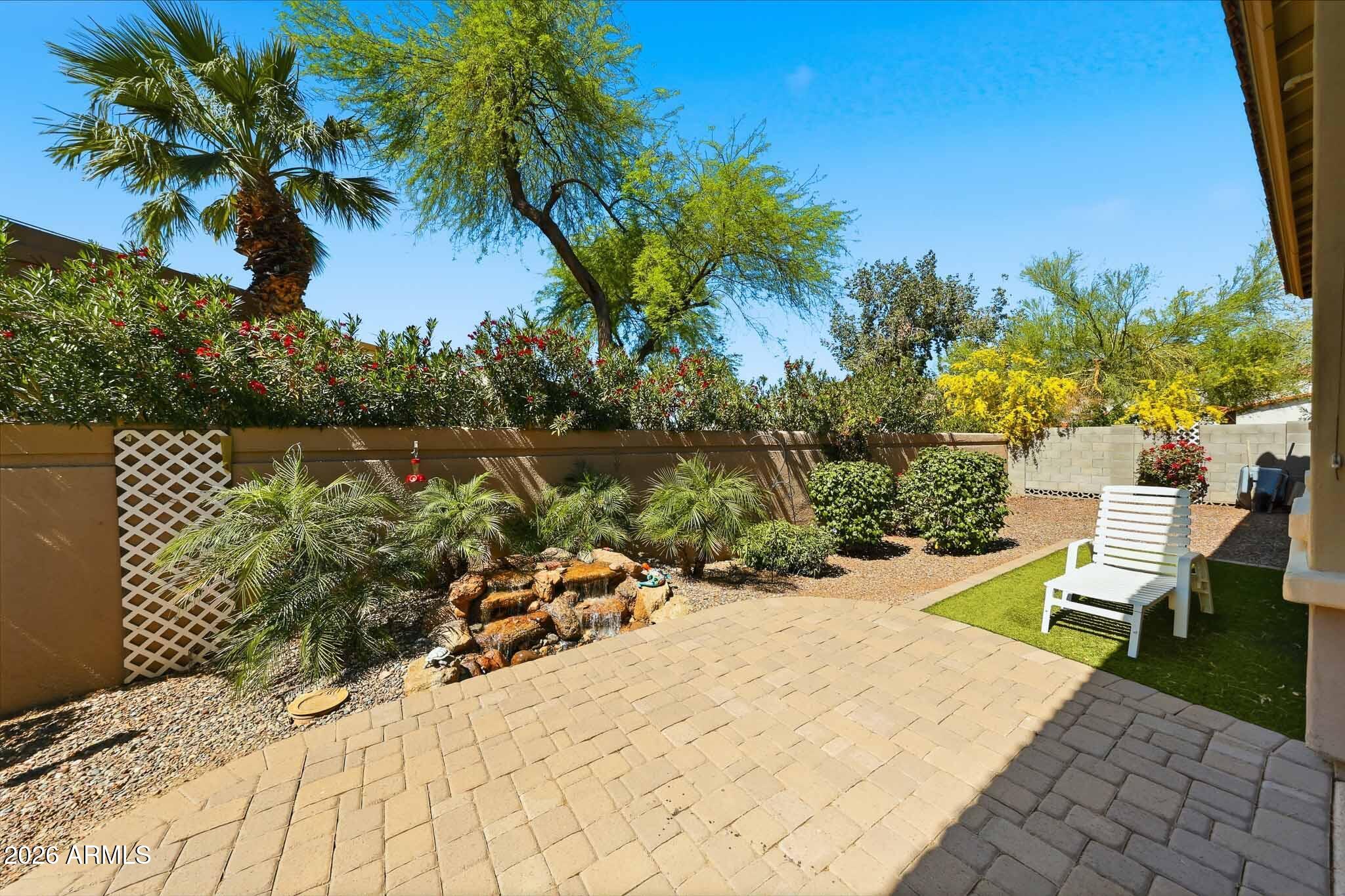 8974 North 8th Lane Phoenix, AZ 85021 - Photo 24 of 29 a view of a backyard with sitting area