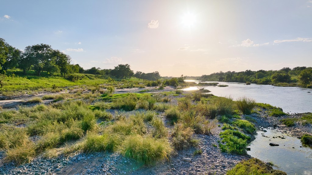 610 Ranch Road 152, Unit 4 Mason, TX 76856 - Photo 11 of 48 a view of a lake with houses in outdoor space
