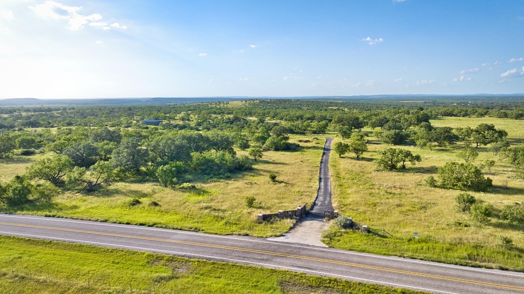 610 Ranch Road 152, Unit 4 Mason, TX 76856 - Photo 16 of 48 a view of a swimming pool with an ocean view
