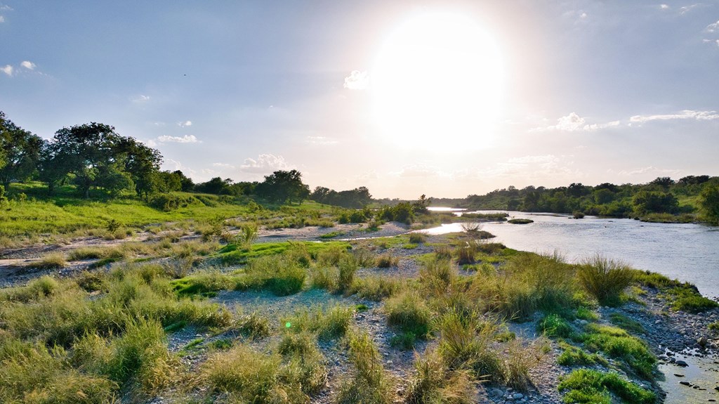 610 Ranch Road 152, Unit 4 Mason, TX 76856 - Photo 19 of 48 a view of lake with green space