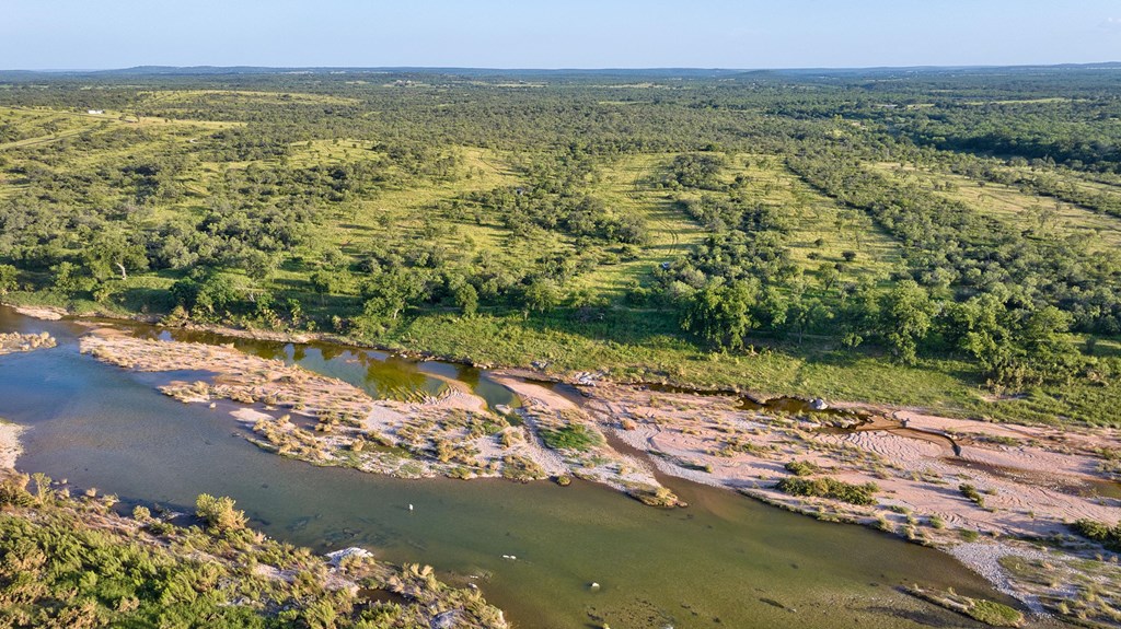 610 Ranch Road 152, Unit 4 Mason, TX 76856 - Photo 22 of 48 a view of a lake with a city