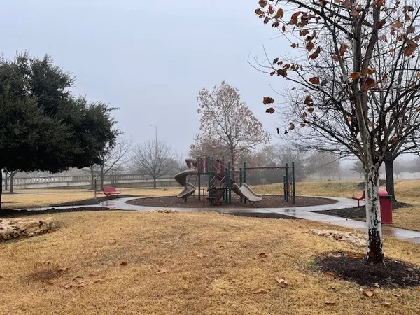 $295,000 | 711 Rolling Oak Drive, Unit 117, Round Rock, TX 78664