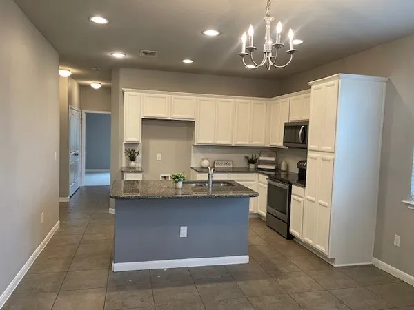 $295,000 | 711 Rolling Oak Drive, Unit 117, Round Rock, TX 78664