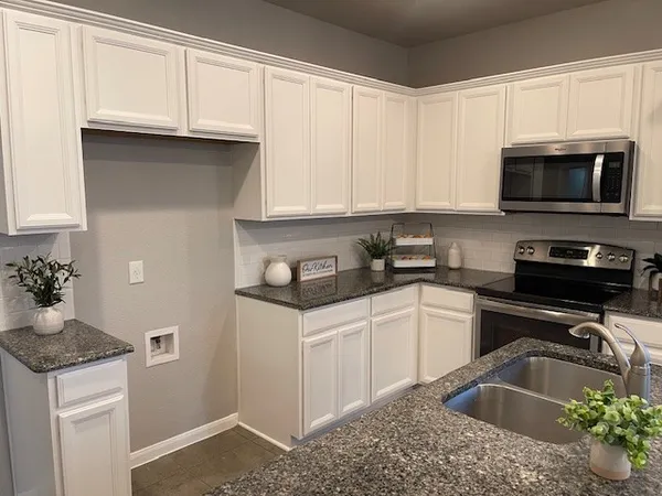$295,000 | 711 Rolling Oak Drive, Unit 117, Round Rock, TX 78664