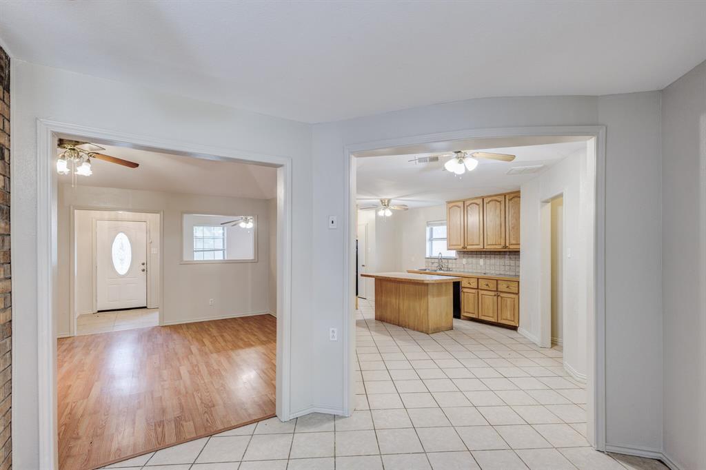 7305 Ridgeview Drive Rowlett, TX 75089 - Photo 15 of 32 a large bathroom with a large mirror vanity and bathtub