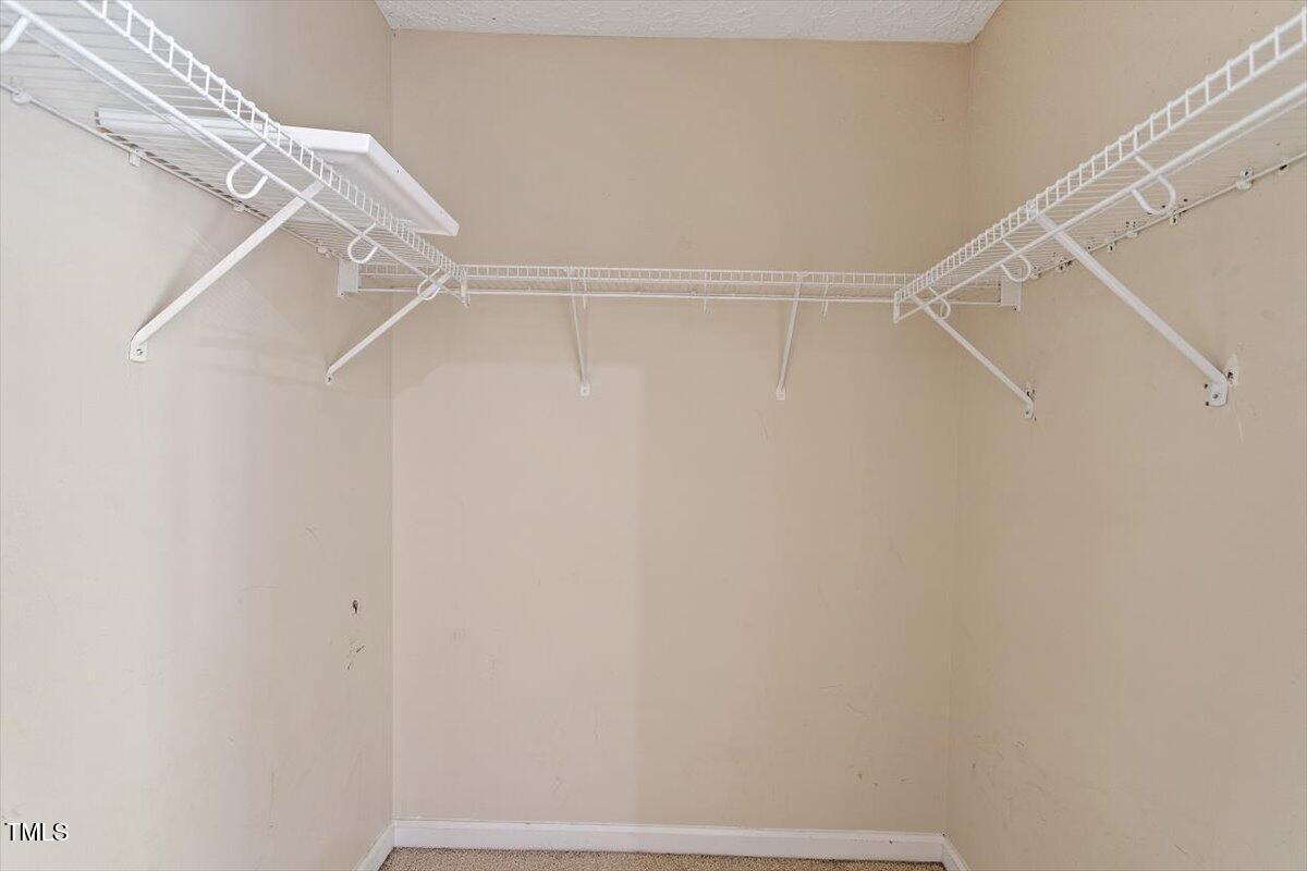 4221 Tensity Drive Raleigh, NC 27604 - Photo 20 of 31 a view of small space with racks on the wall