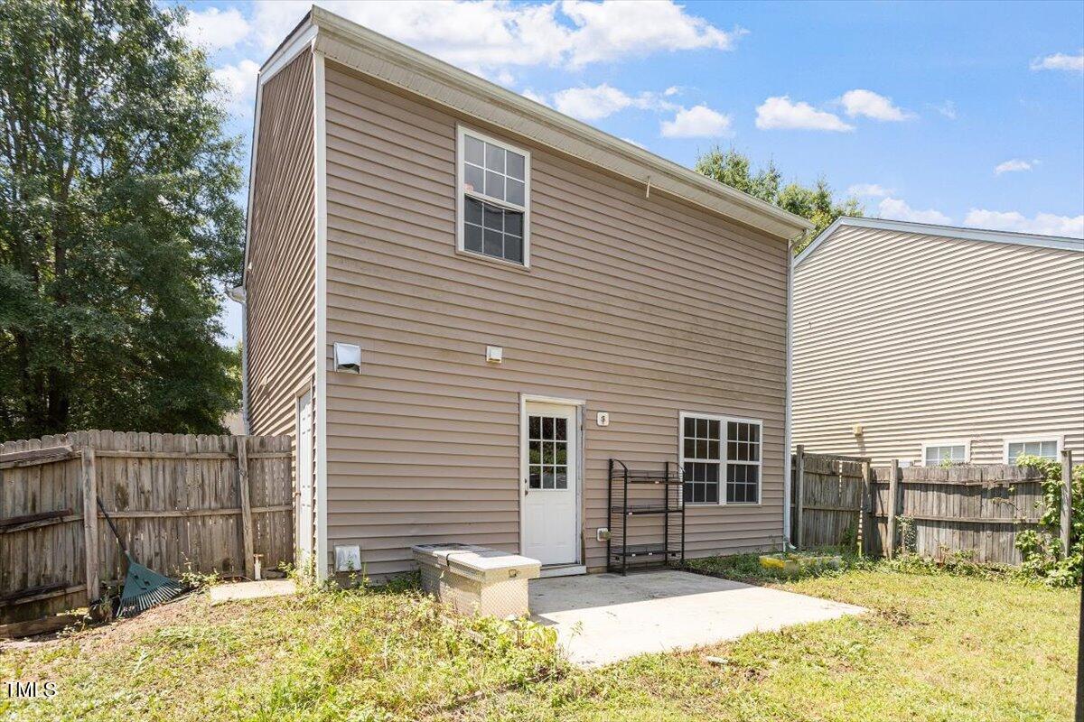4221 Tensity Drive Raleigh, NC 27604 - Photo 29 of 31 a view of a backyard with a tree