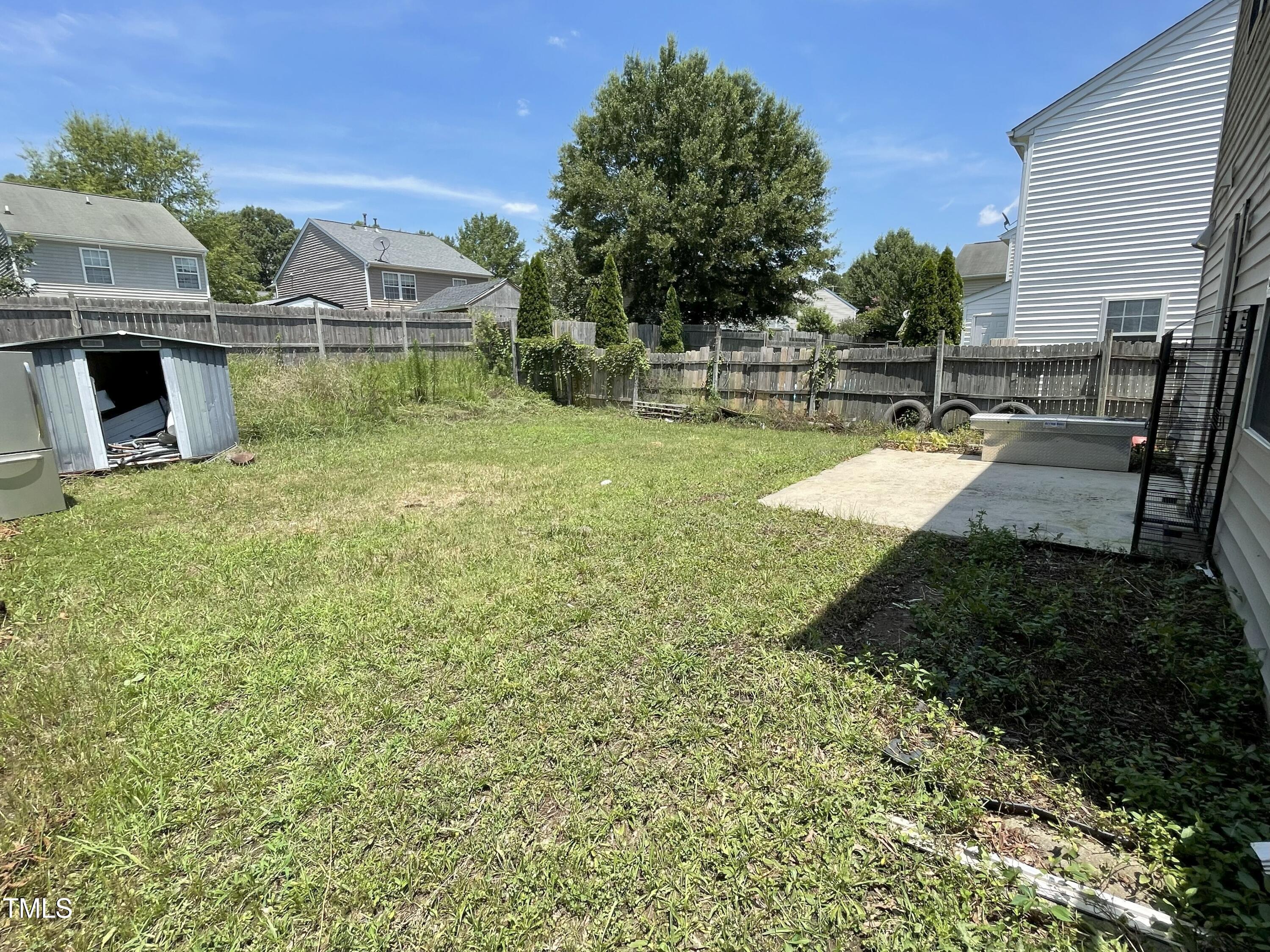 4221 Tensity Drive Raleigh, NC 27604 - Photo 30 of 31 a view of a swimming pool with a patio