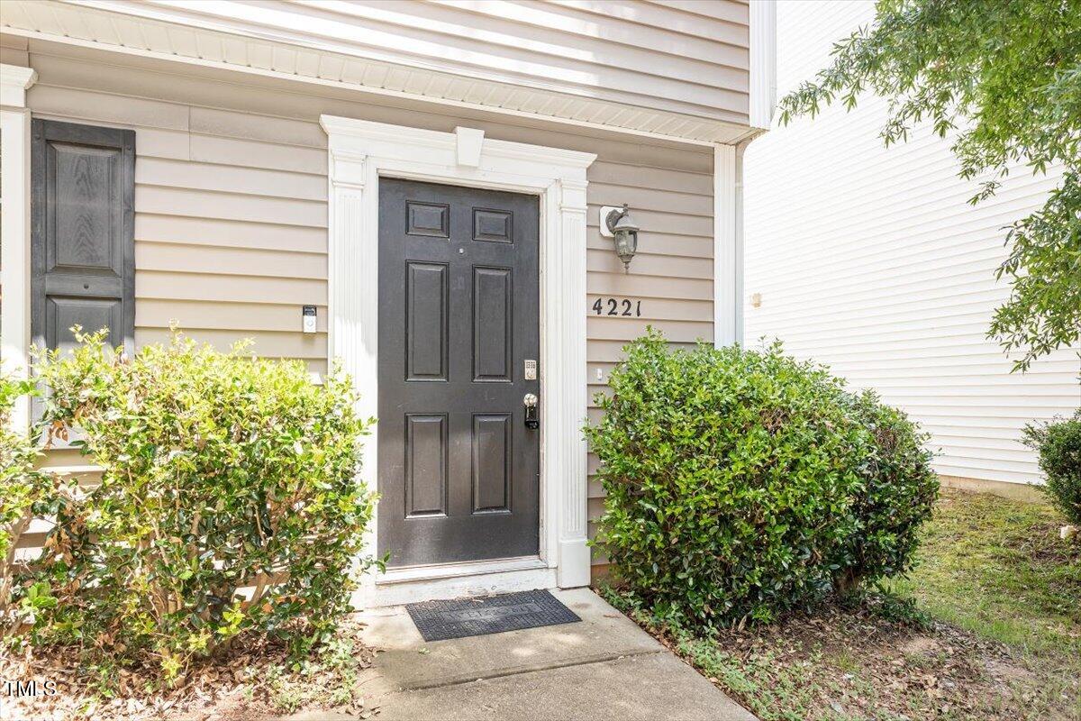 4221 Tensity Drive Raleigh, NC 27604 - Photo 3 of 31 a view of house with backyard