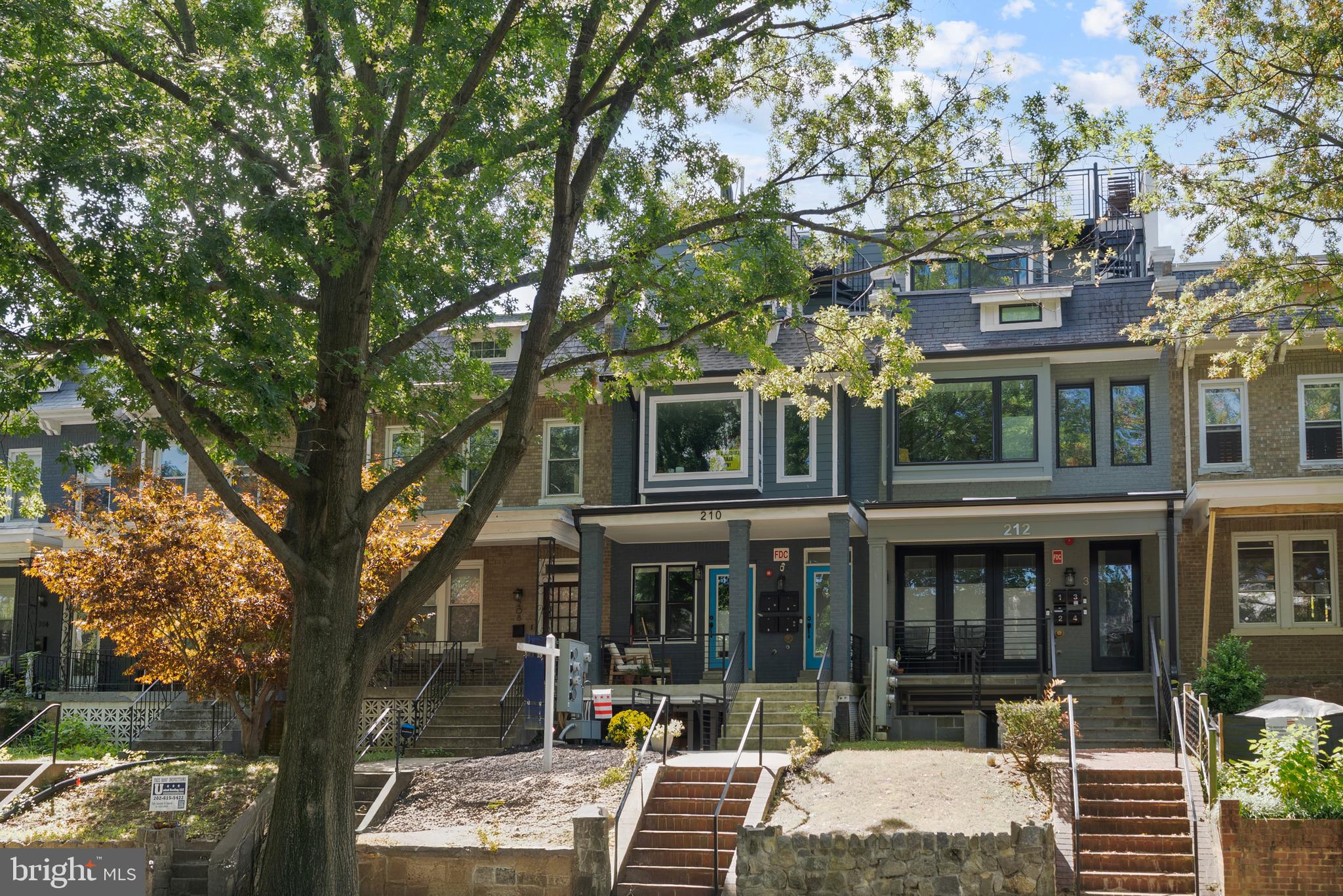 210 Varnum Street Northwest, Unit 1 Washington, DC 20011 - Photo 1 of 22 a front view of a building with street view