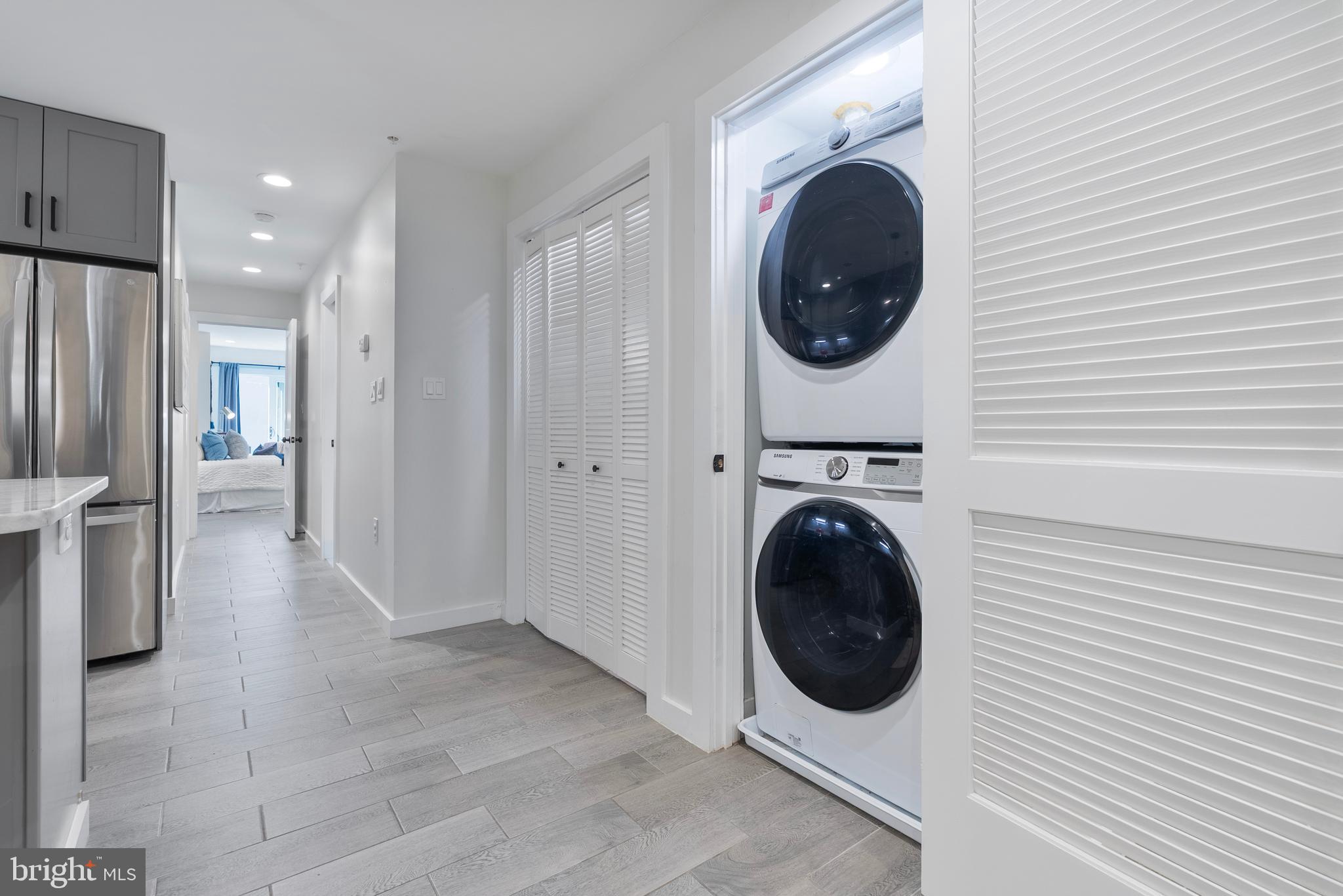 210 Varnum Street Northwest, Unit 1 Washington, DC 20011 - Photo 17 of 22 a view of a hallway with washer and dryer