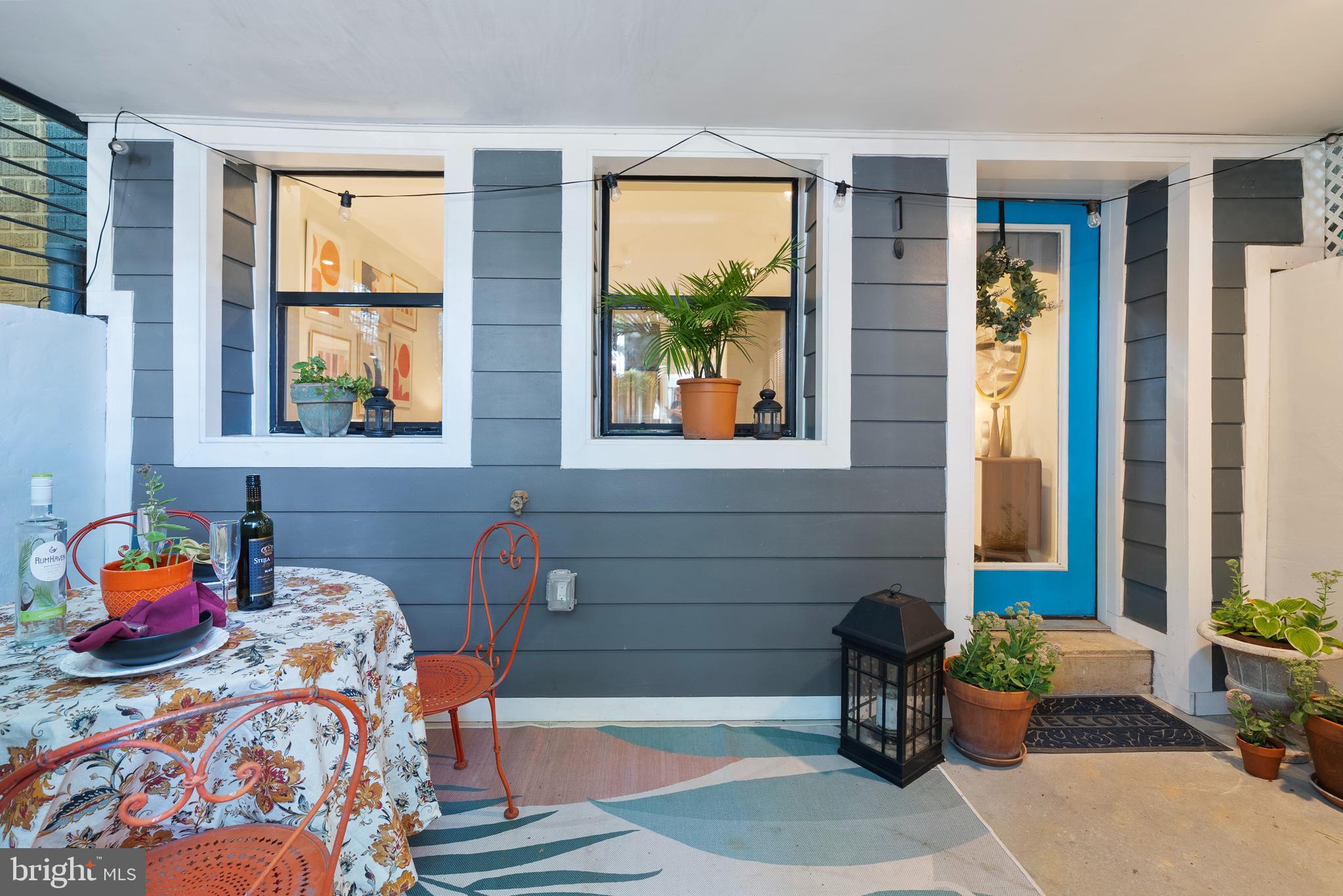 210 Varnum Street Northwest, Unit 1 Washington, DC 20011 - Photo 2 of 22 a bedroom with bed and wooden floor