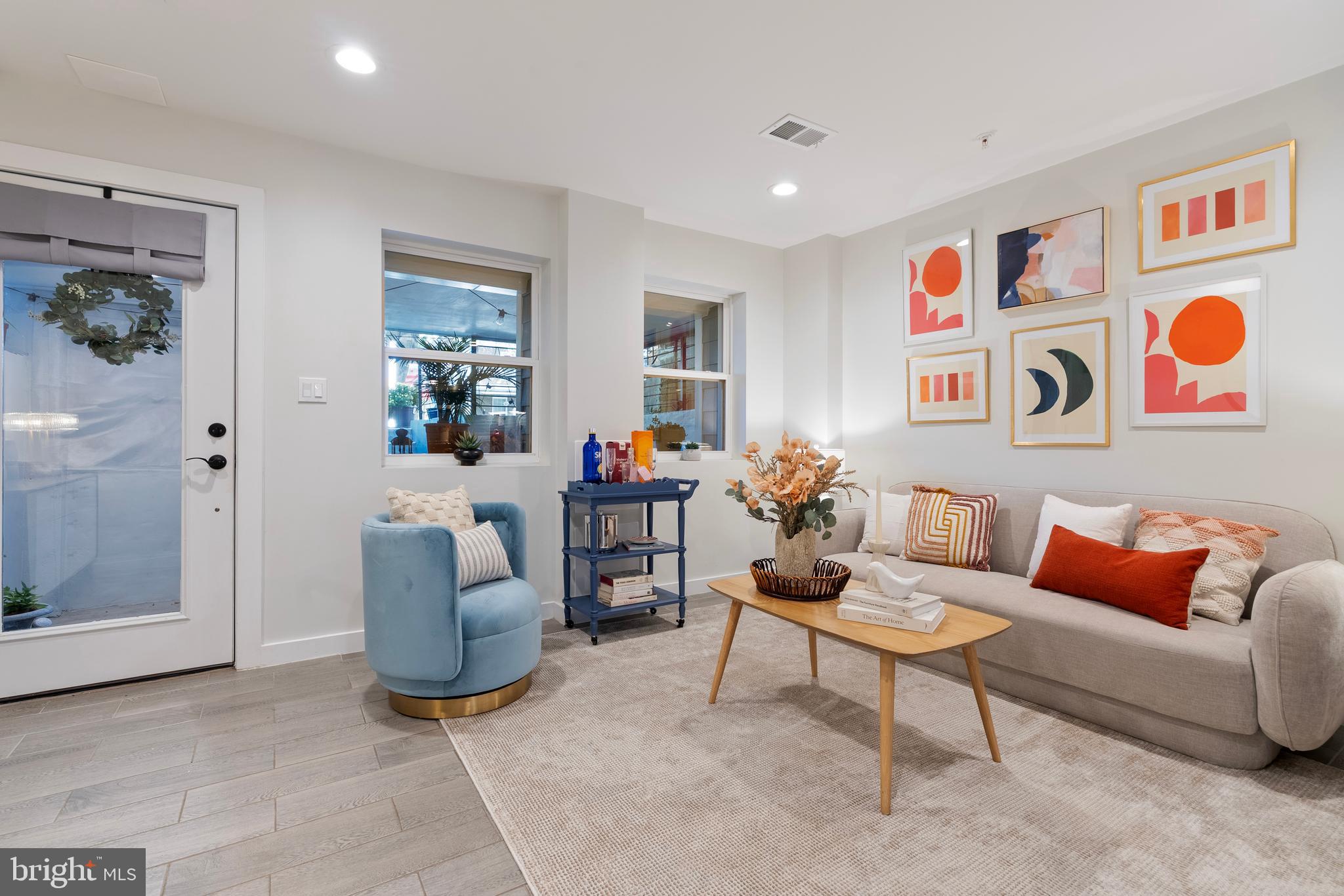 210 Varnum Street Northwest, Unit 1 Washington, DC 20011 - Photo 5 of 22 a living room with furniture rug and window