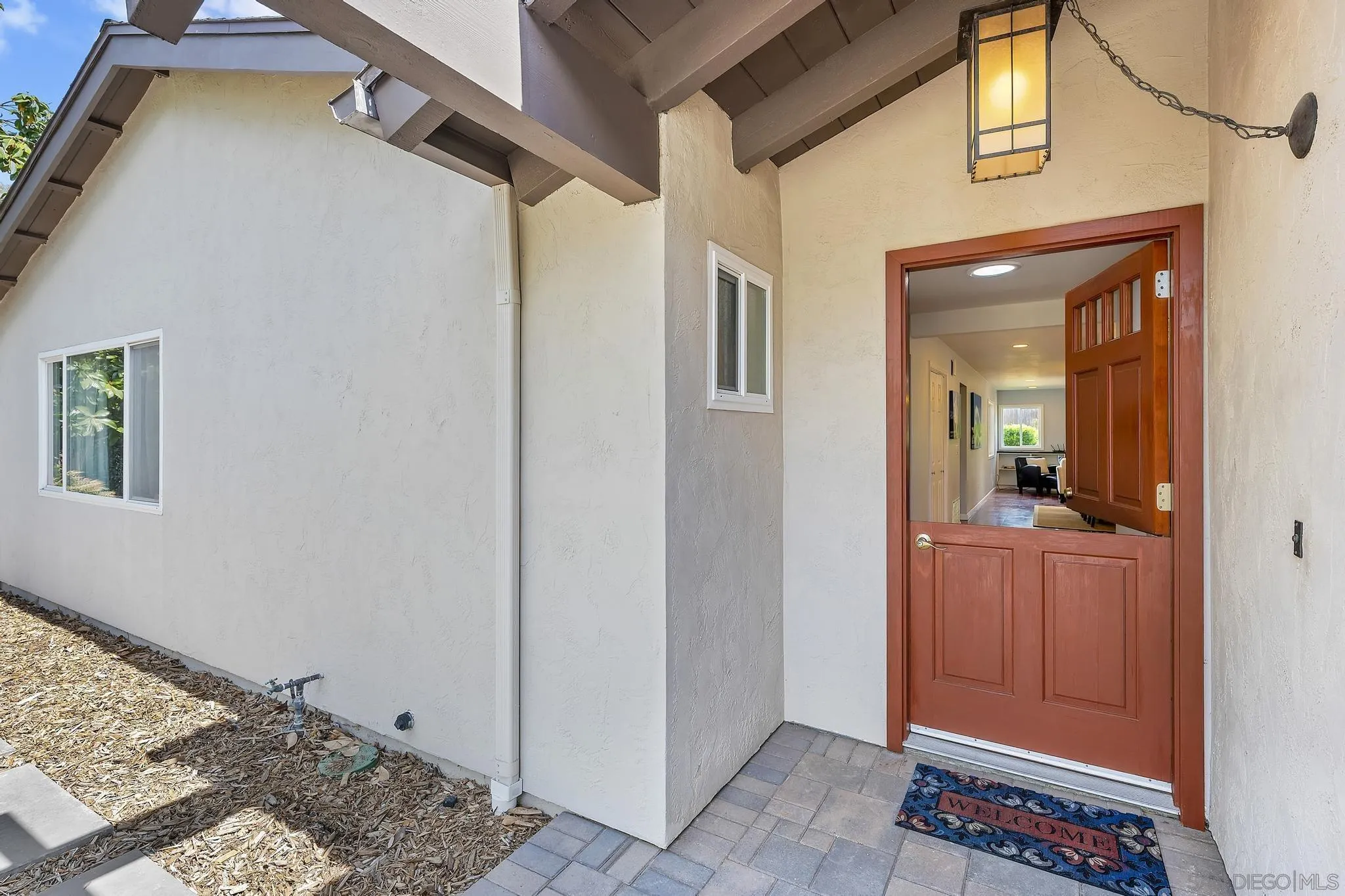 236 Rancho Santa Fe Road Encinitas, CA 92024 - Photo 2 of 32 a view of a hallway with windows and closet
