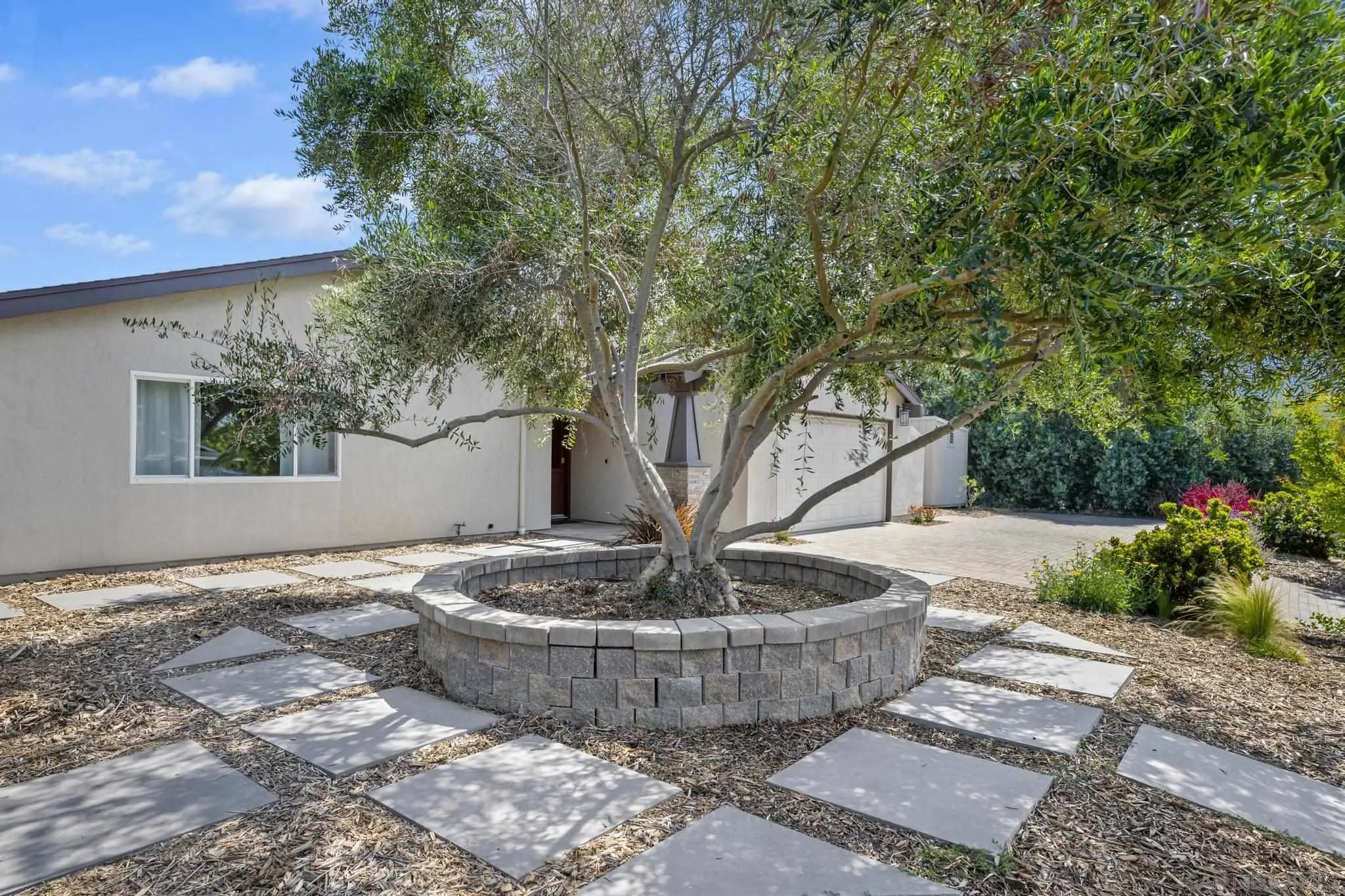 236 Rancho Santa Fe Road Encinitas, CA 92024 - Photo 28 of 32 a view of a fountain in the backyard of house