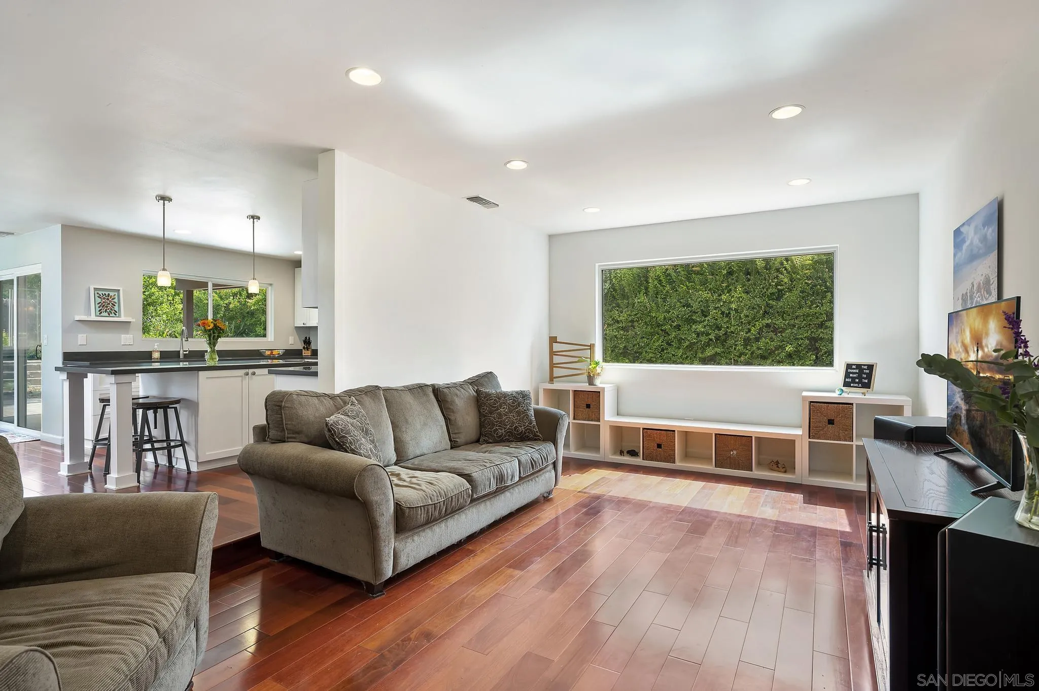 236 Rancho Santa Fe Road Encinitas, CA 92024 - Photo 3 of 32 a living room with furniture and a flat screen tv