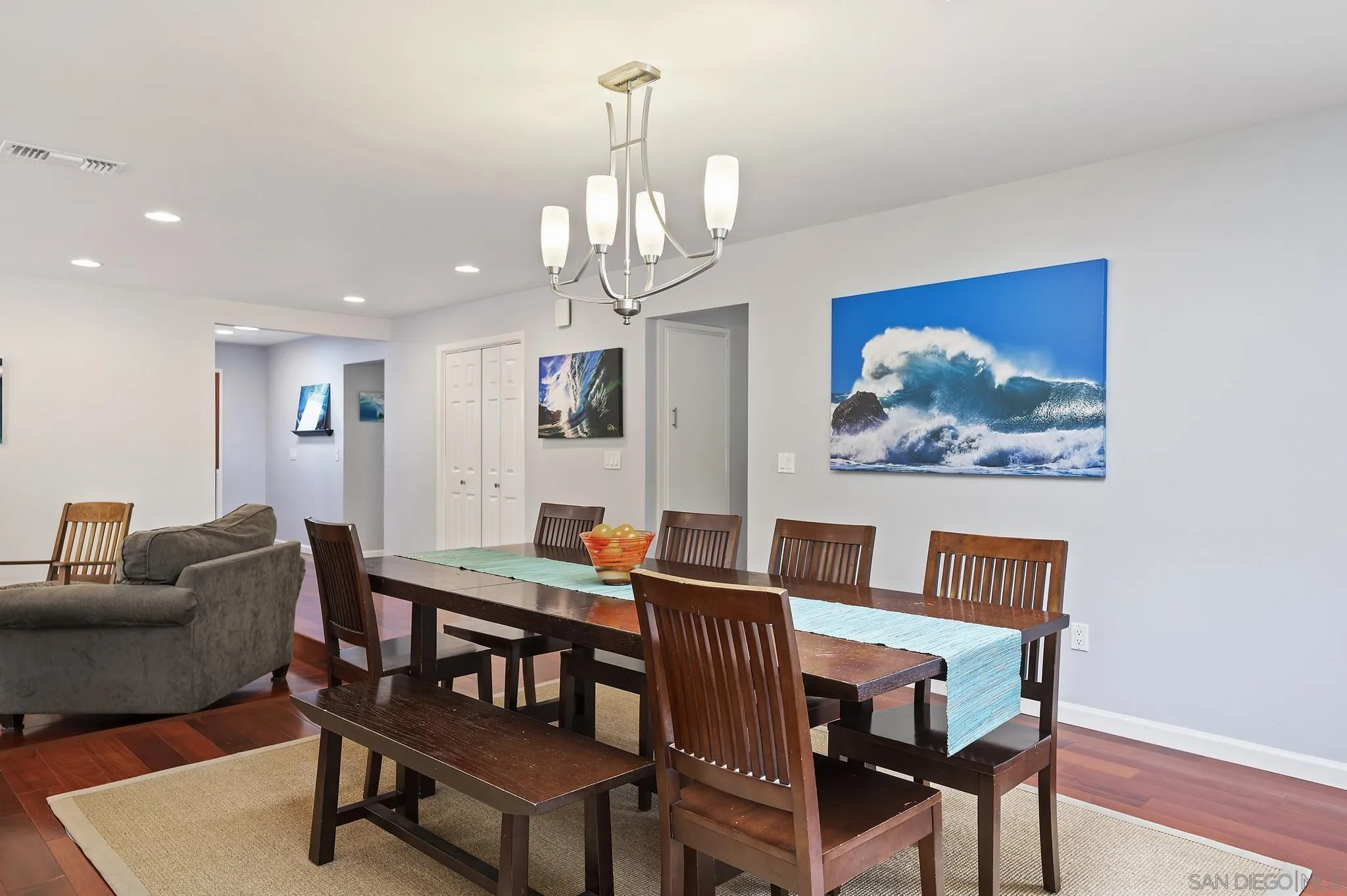 236 Rancho Santa Fe Road Encinitas, CA 92024 - Photo 7 of 32 a view of a dining room with furniture and wooden floor