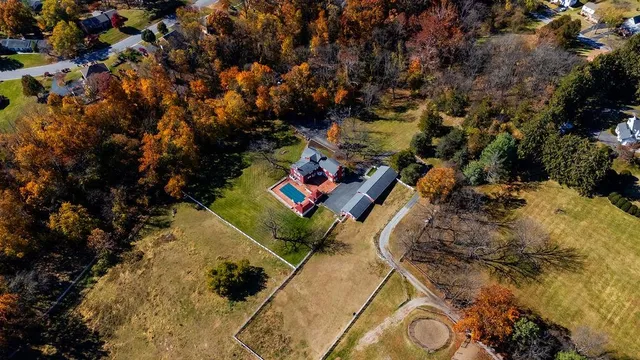 a view of a utility room with closet and racks