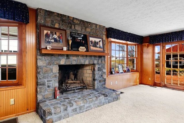 a bathroom with a sink and a mirror with toilet