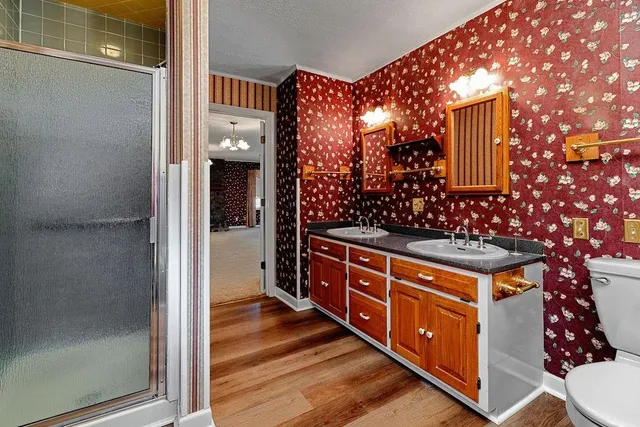 a view of a room with wooden walls